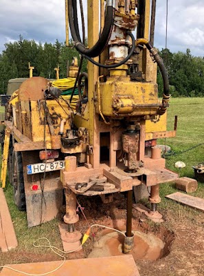 Technician repairing a pump assembly